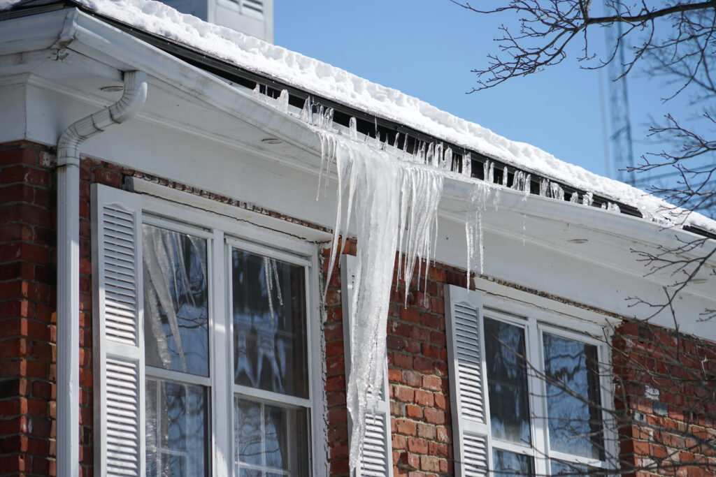 The weight of snow load on a roof can be dangerous, potentially leading to structural damage or even roof collapse.